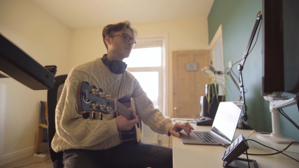 Matthew at his desk during an online lesson